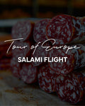 Sliced salami with text 'Tour of Europe Salami Flight' on a wooden board.